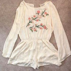 Cream Flowered Long-Sleeved Romper